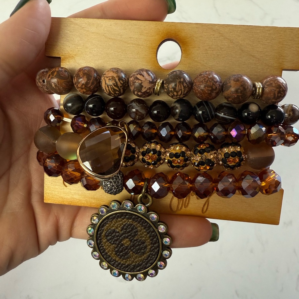 Stacked bracelet set, total of 5 bracelets, one with leather Louis Vuitton print
